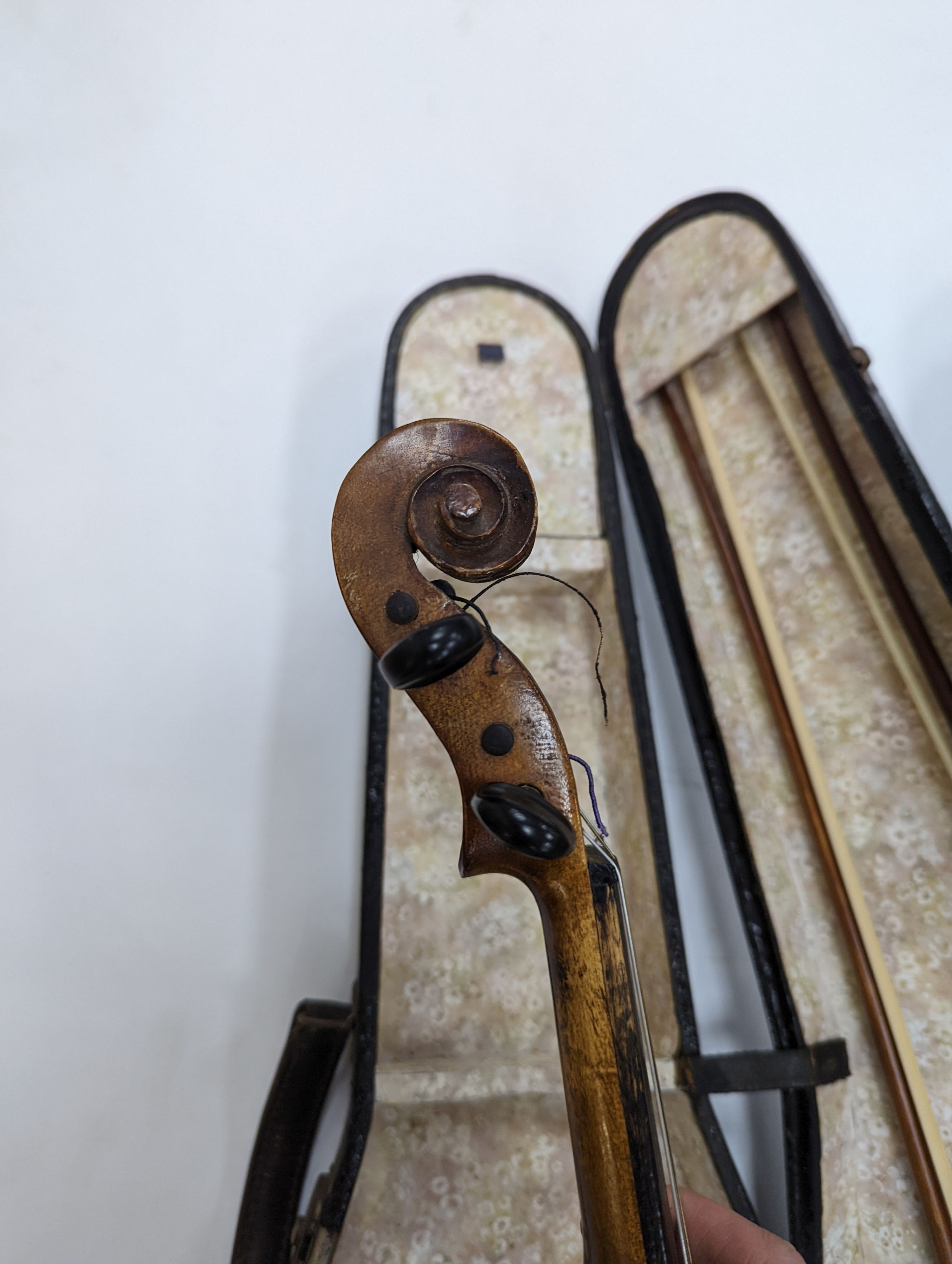 Two cased violins and bows, one with ‘Antonius Straduarius Cremonensis Faciebat Anno 17/13 Made In Czechoslovakia’ label to interior